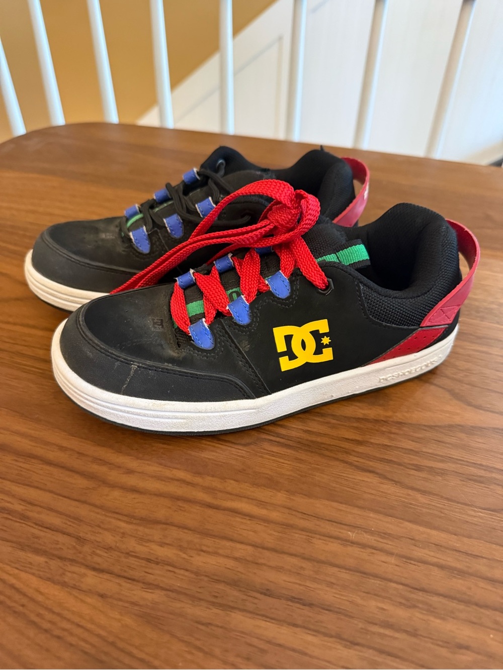 DC Kids Black Sneakers with Red Laces and Yellow Logo
